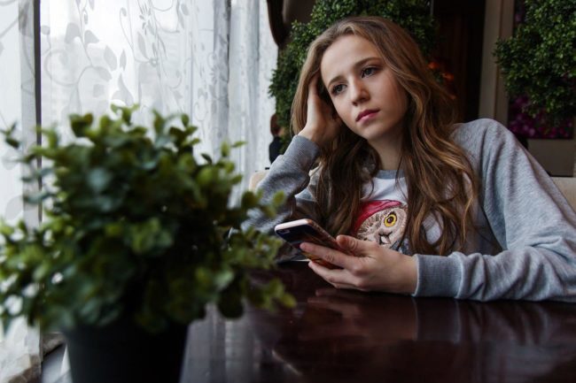 Teenage girl with phone